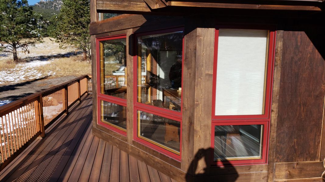 Aluminum-clad wood window on a classic home with detailed trim