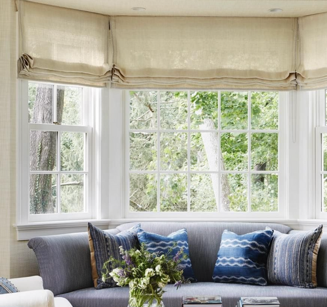 Bay window providing abundant natural light and creating a bright, inviting interior space