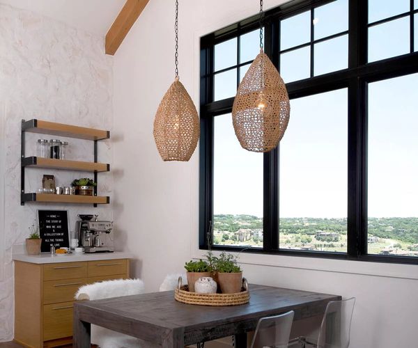 Cape Cod home with Andersen black-frame windows and patio door