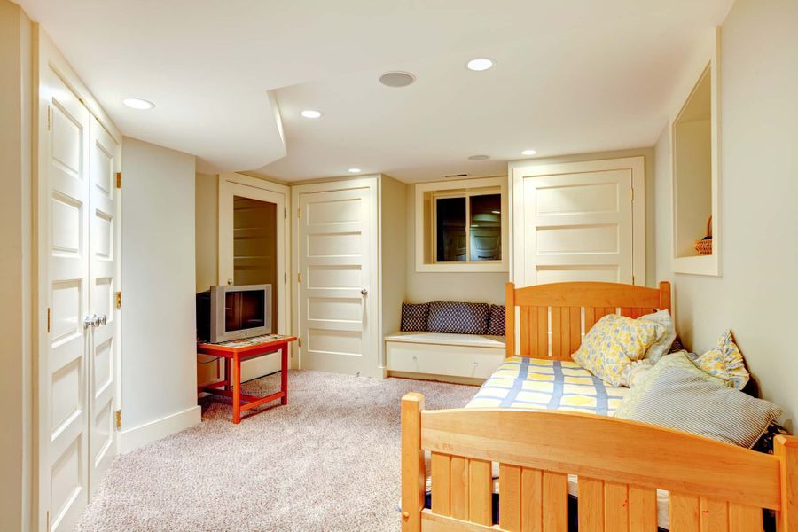 Large egress window providing emergency exit and light in basement